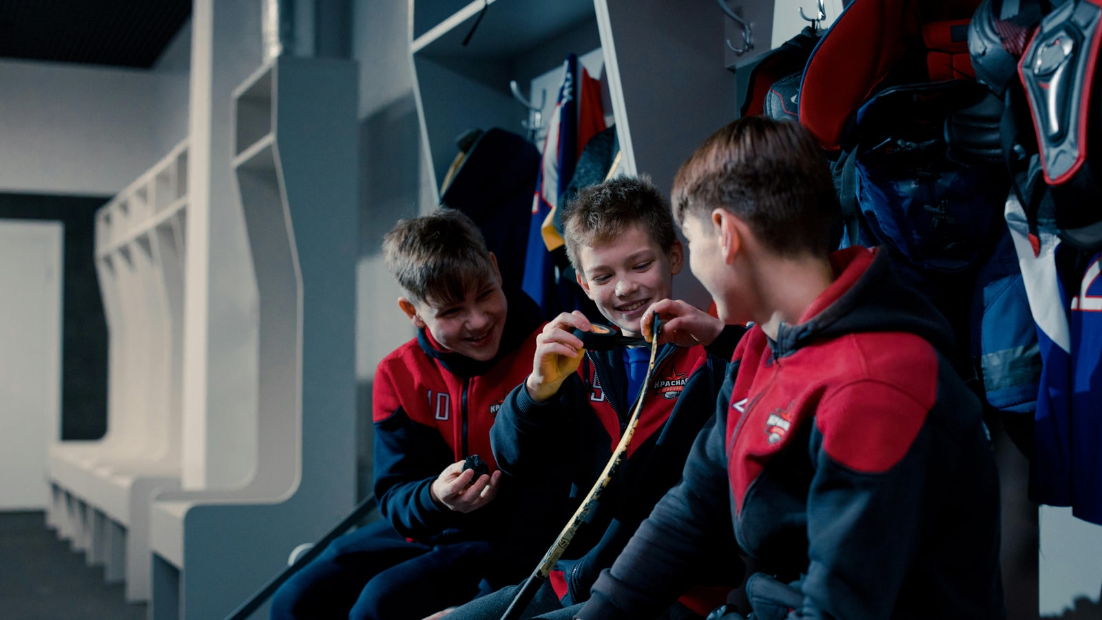 Why do hockey players tape their hockey sticks?