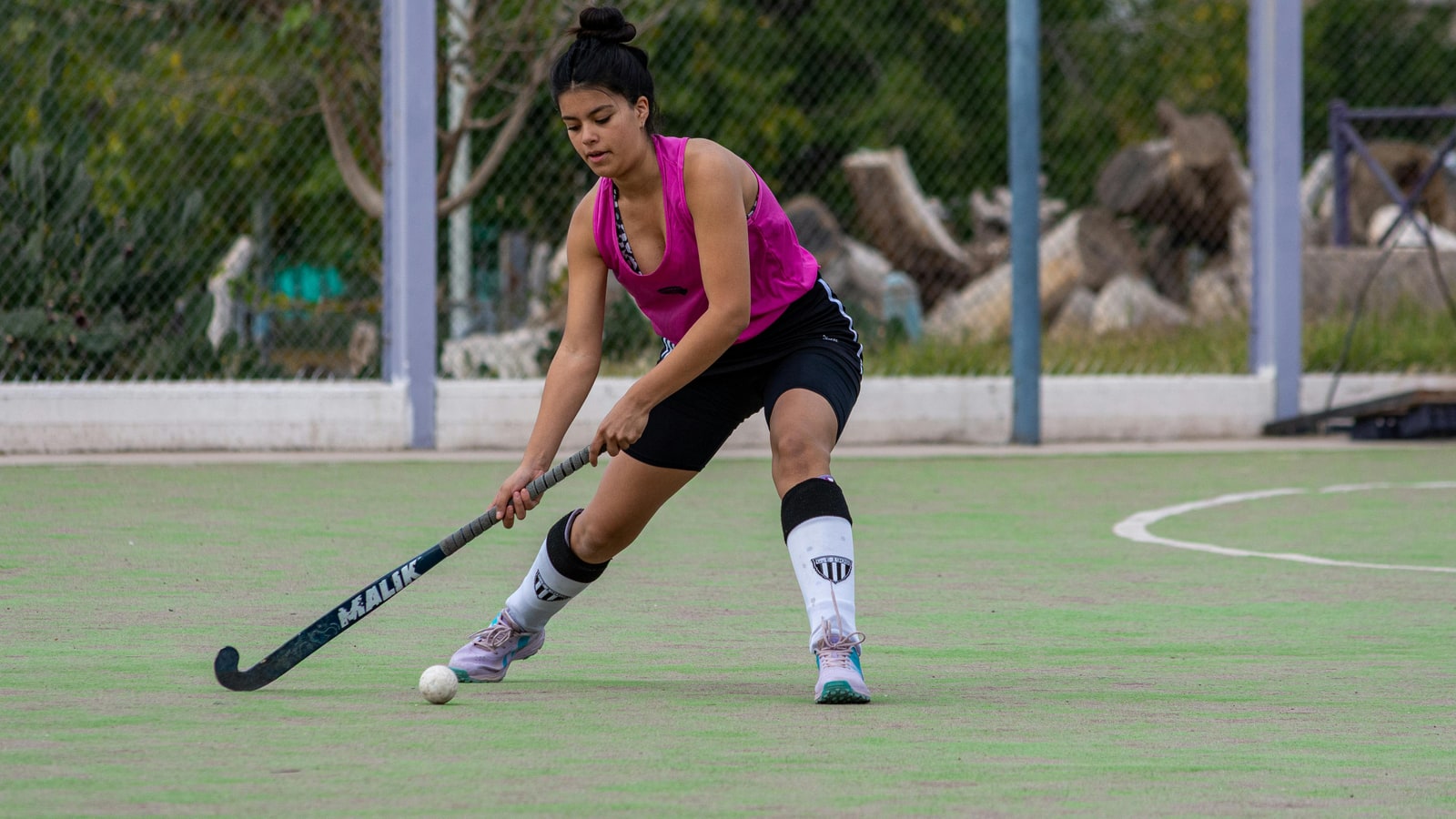 Who was the first woman to play hockey?