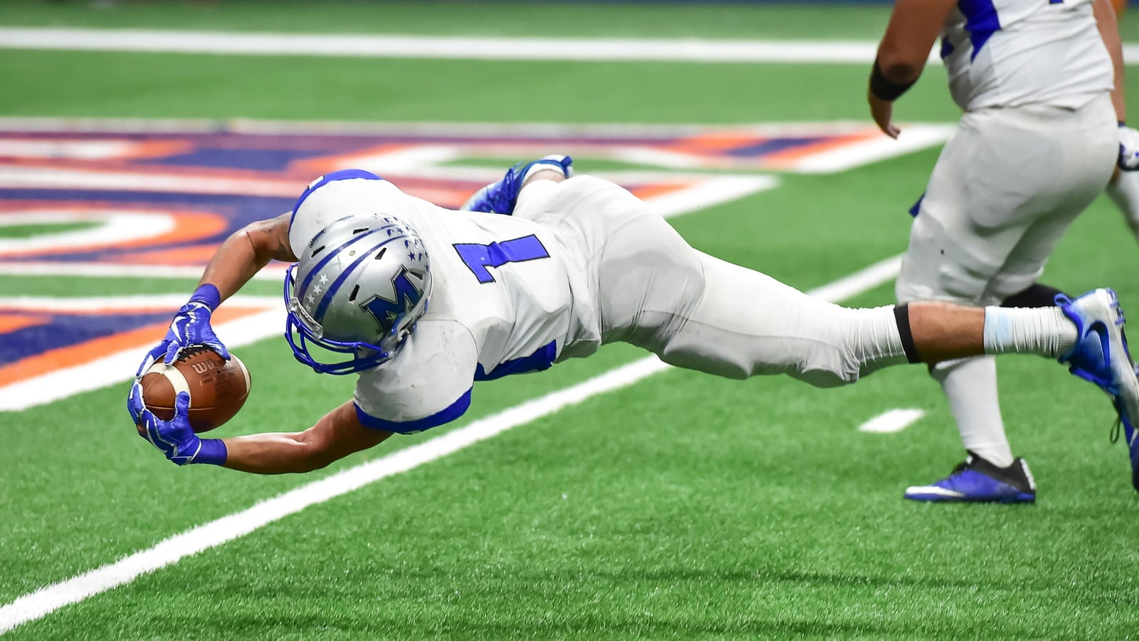 Where does the ball start in flag football?