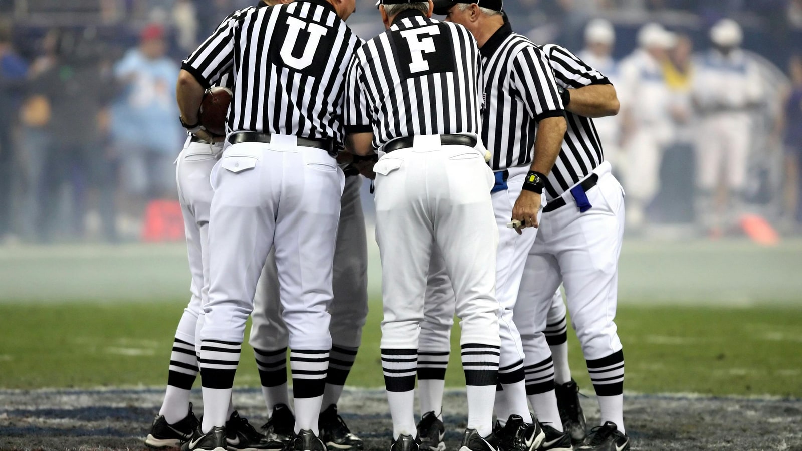 Why don't NFL balls have white stripes?