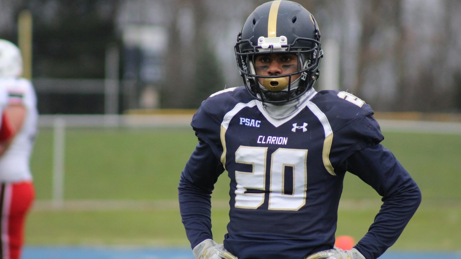 Why do football players wear helmets?