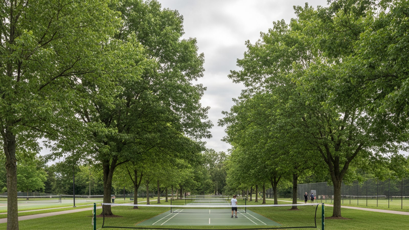 What is the size of a badminton court in feet?