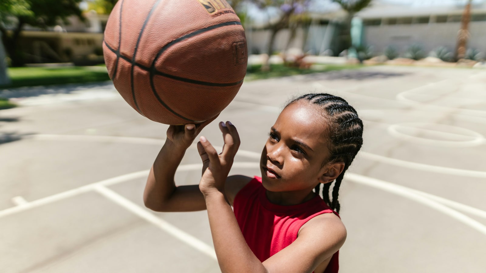 Why is it important for kids to learn to shoot a basketball?