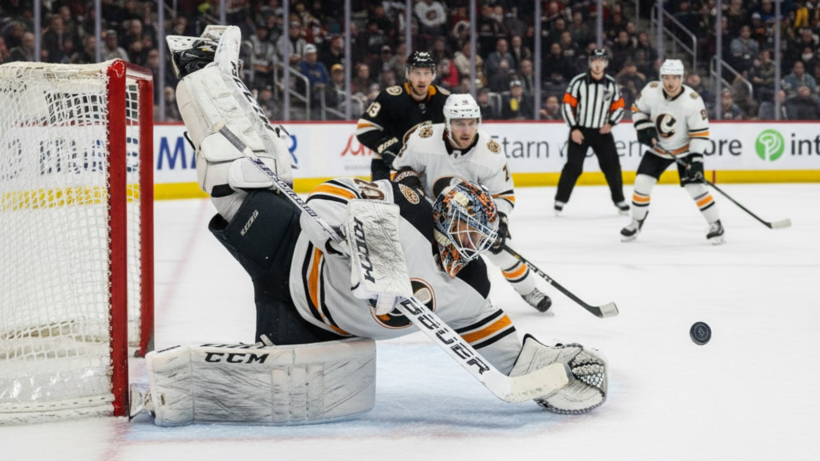 What does "standing on his head" mean in hockey?