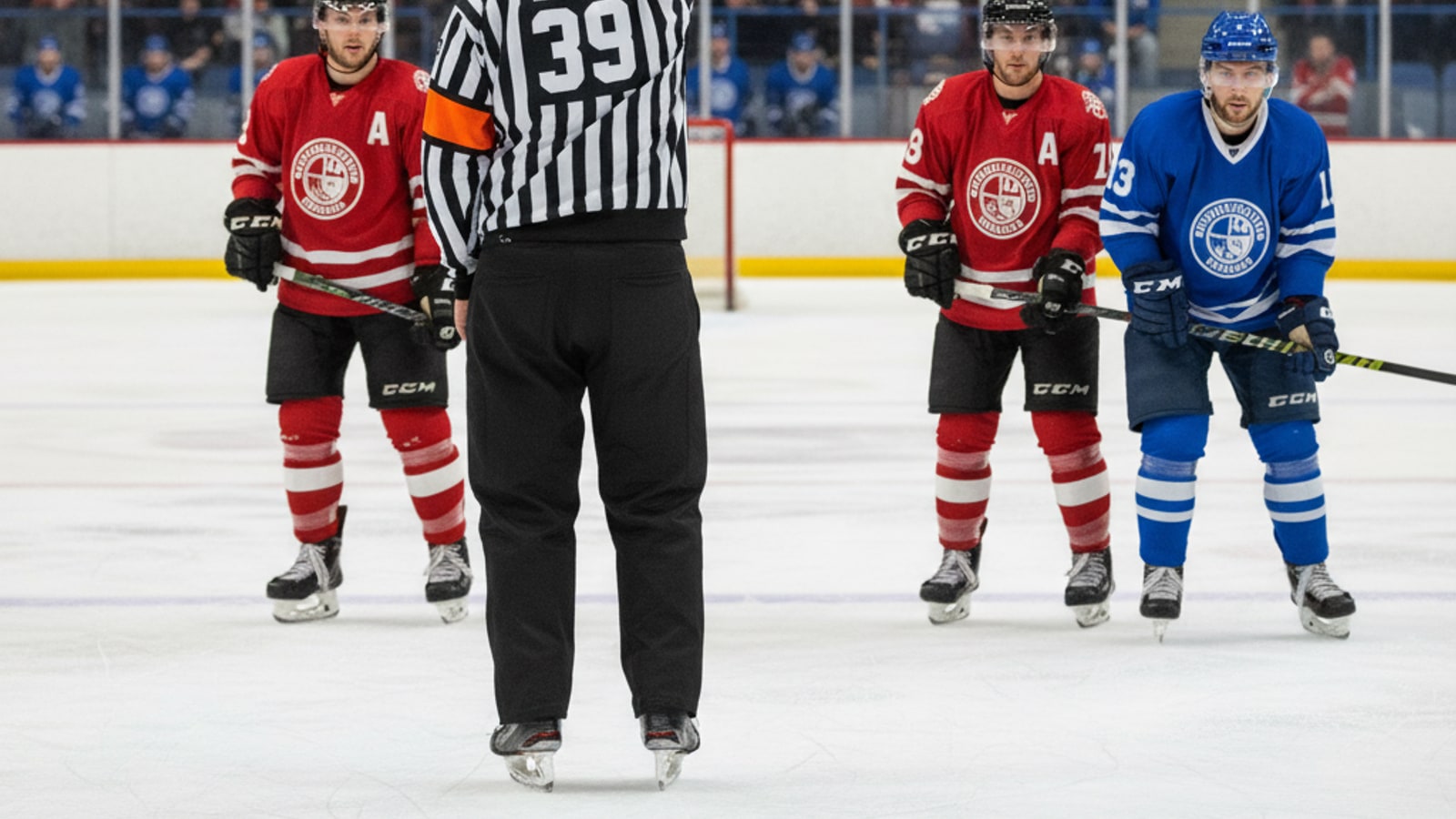 How does the referee signal a penalty in hockey?