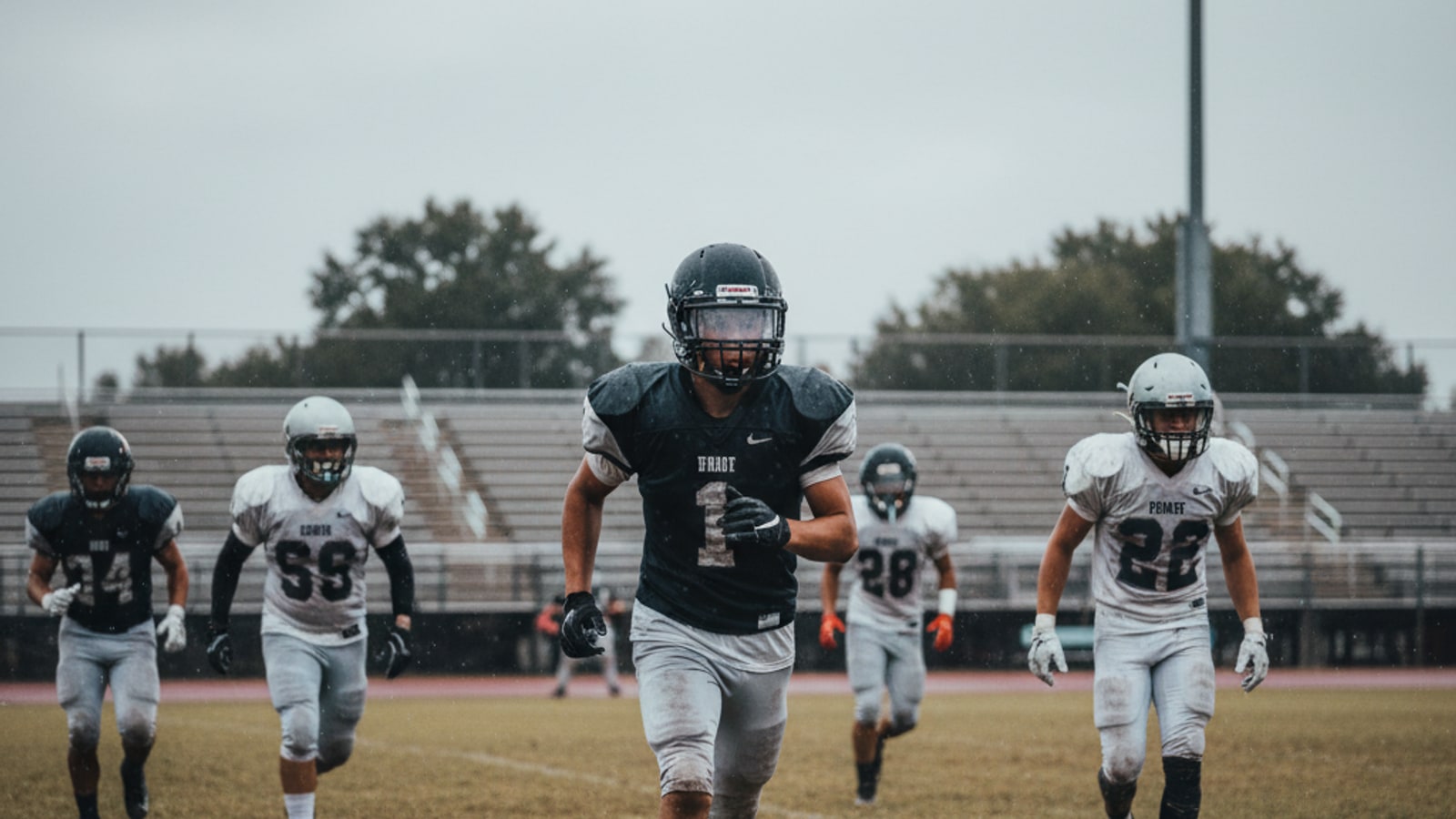 Do football players wear masks?