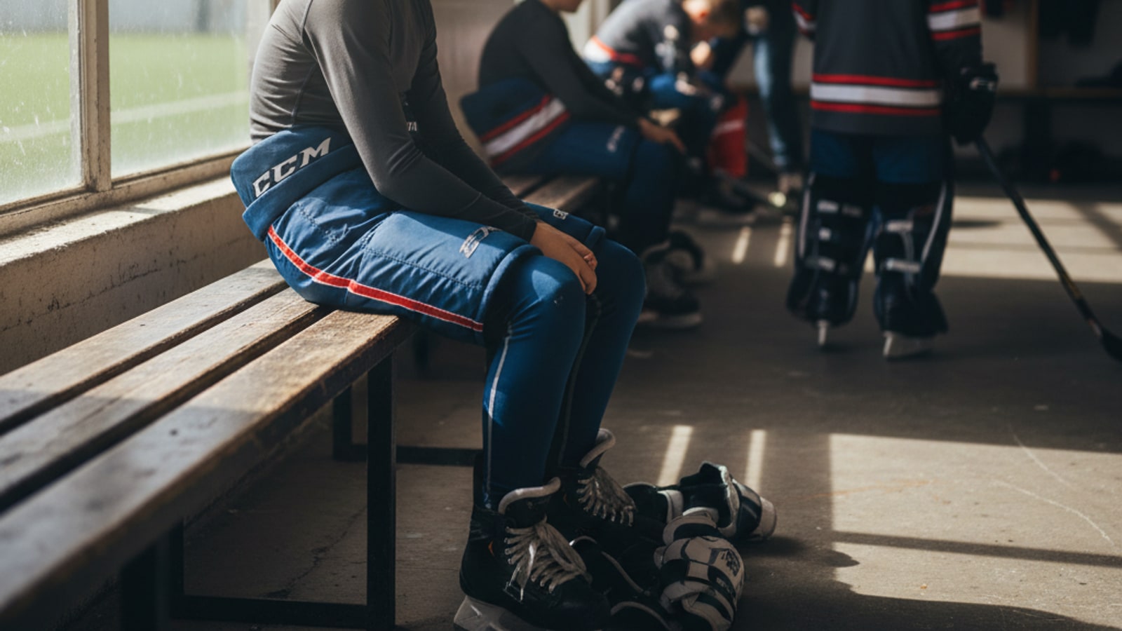 What should my son wear under his hockey pads?