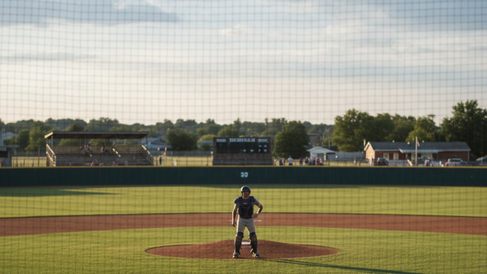 What is the player called on defense behind home plate?
