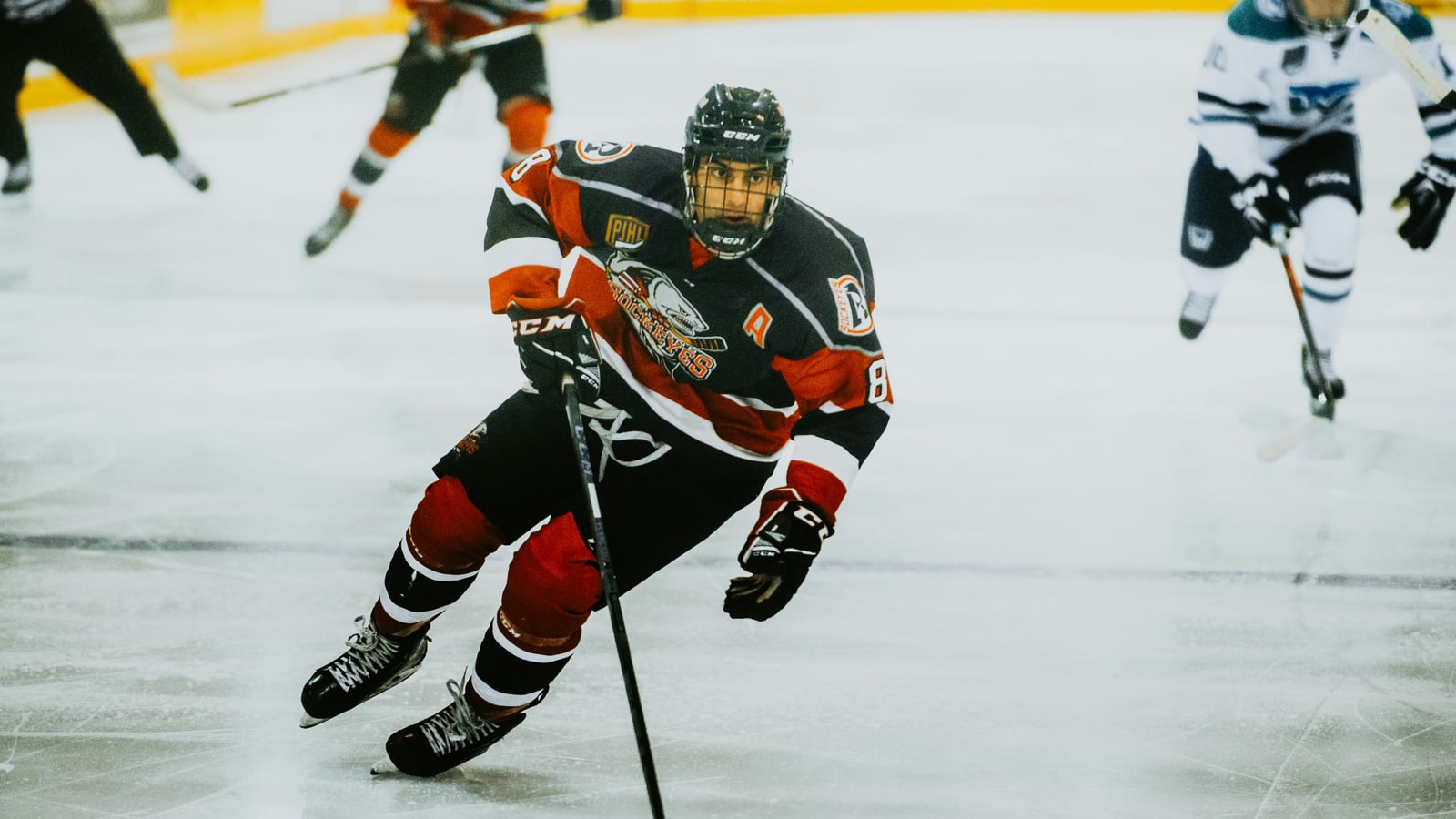 Why are ice skating and ice hockey so popular in Canada?