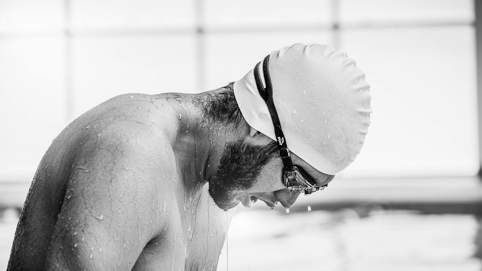 Who was the first black swimmer to qualify for the Olympics?