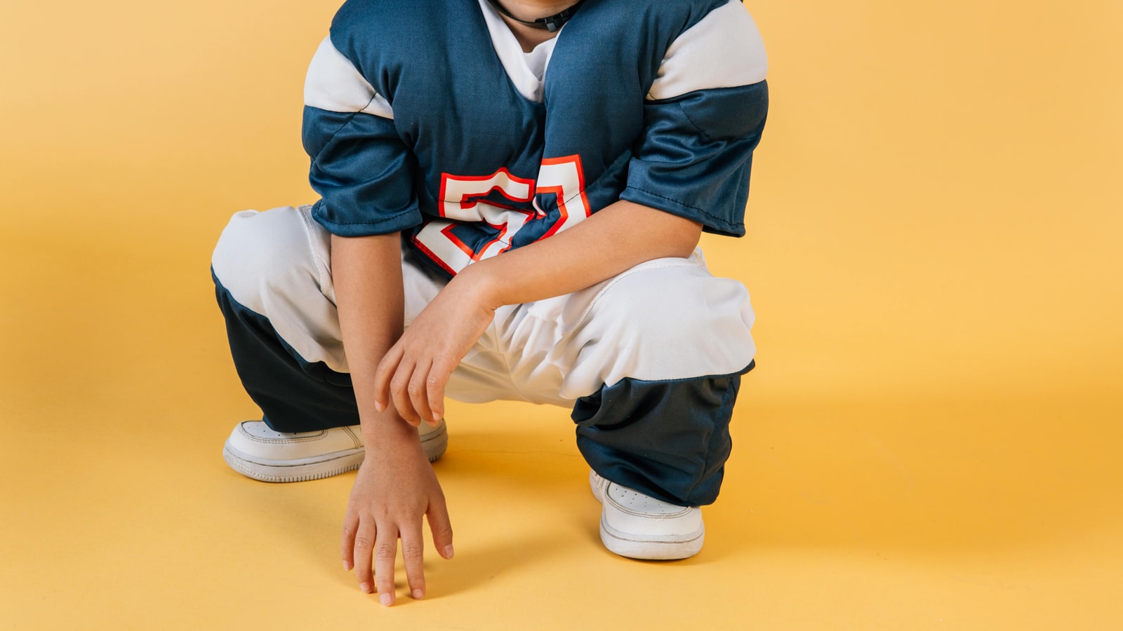 Why do football players do squats?