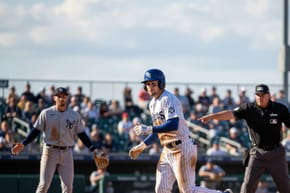 Can a Batter Be Awarded First Base if the Ball Strikes the Ground?