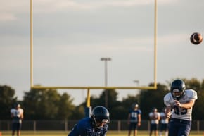 How Does a Football Holder Hold the Ball?