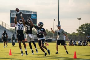 What Did Glover Quin Do in Training Camp?